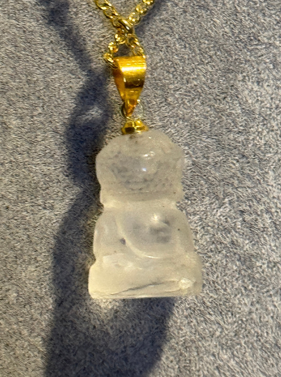 Bergkristall Anhäger als Buddha