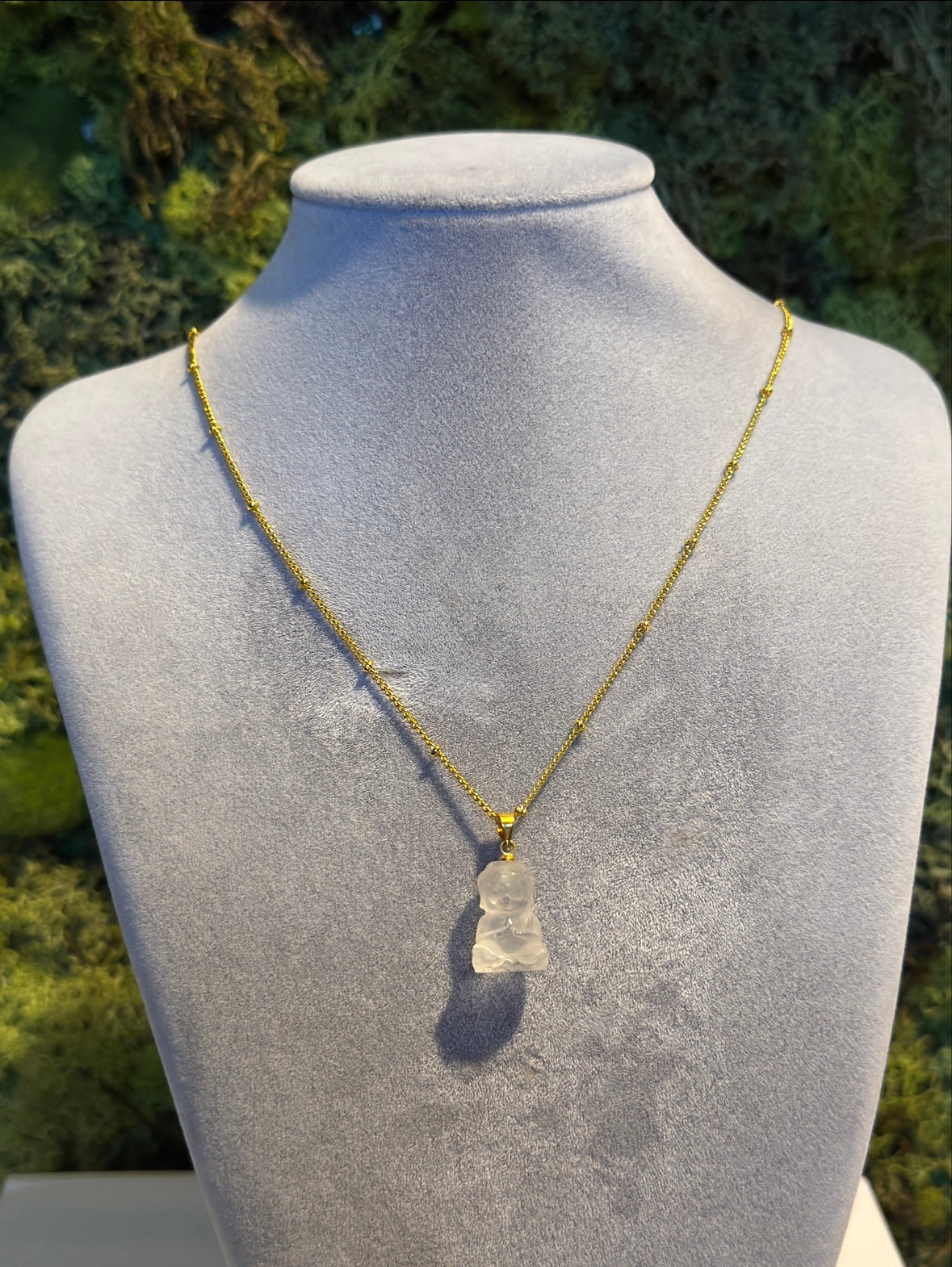 Bergkristall Anhäger als Buddha